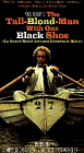 The Tall Blond Man With One Black Shoe