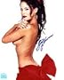 Stacy Kamano Autographed "Red Bow" 8" x 10" Color Photograph (Unframed)