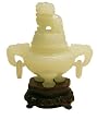 Carved jade incense censer with detailed fu dog on lid