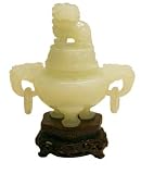 Carved jade incense censer with detailed fu dog on lid