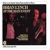 Revue Brian Lynch  / At The Main Event