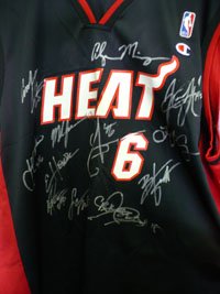 Signed Heat, Miami (2001-02) Champion Replica Jersey by the 2001-01 Miami Heat Team. 14 Signatures Total