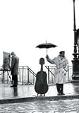 Musician In The Rain - Artist: Unknown - Art Print Poster Size: 19.75 by 27.50 inches
