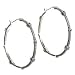 Earrings by Judith Jack