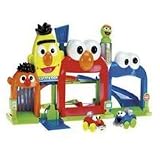Fisher Price Giggle & Go Garage Combo with 2 Cars and with the Cookie Monster Van and Ernie Tow Truck.