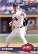 25 Different Baseball Cards of Greg Maddux in Display Album