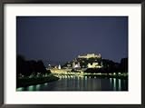 The City is Illuminated at Night Casting a Soft Glow onto the River, Salzburg, Austria Framed Photographic Poster Print by Taylor S. Kennedy, 29x21