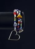 Pinata bracelets with silver heart
