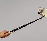 Handstativ "Quik Pod Pro" mit Teleskopauszug - erm�glicht die Selbstaufnahme vor variablem Hintergrund. Mit 1/4" Stativgewinde. Passend zu den Kameras Canon IXUS 800IS / 850IS / 900TI / 950IS, Canon Powershot S3IS / S5IS, Panasonic FZ50 / FZ30 / FZ8 / TZ1 / TZ2 / TZ3 / TZ4 / TZ5, Sony W85, usw - 