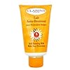 Clarins by Clarins: SELF TANNING MILK SPF 6--/4.2OZ