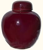 8” high Regal Chinese porcelain ginger jar with ox blood red glaze.