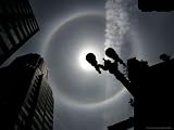 The Sun and Atmospheric Conditions Combine to Create a Rainbow Colored Ring Around the Sun Photographic Poster Print, 24x18