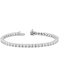 14KT White Gold Sophisticated Diamond Tennis Bracelet featuring 50 Prong Set Round Brilliant Cut Diamonds in Basket Style Settings. 7 1/2 CTW