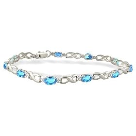 14K White Gold Genuine Oval Blue Topaz and Diamond Bracelet by Jewels For Me