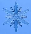 4.5" Icy Crystal Blue Beveled Flower Snowflake Christmas Ornament