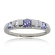Modern Tanzanite and Diamond Ring Done in 14 Karat White Gold