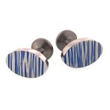 Handmade titanium oval shaped cufflinks with blued titanium accents