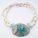 Meg Carter Designs: blue abalone shell, mother of pearl nuggets, blue calcite and freshwater pearls. The 