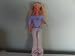 1993 BARBIE IN STAR PANTS AND BLUE BLOUSE AND SHE HAS GLASS ON AND EAR PHONE RADIO ON