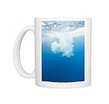 Diver plunging into the sea Photo Mugs