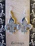 Silver Rhinestone Fleur de Lis Earrings. Fleur de Lis is approximately 1 1/4 inch tall & 1 inch wide - Celebrate New Orleans Re Birth, Louisiana Recovery,The Road Home, & Louisiana with these Beautiful Earrings!!!