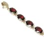 Oval Garnet Line Bracelet - JewelryWeb