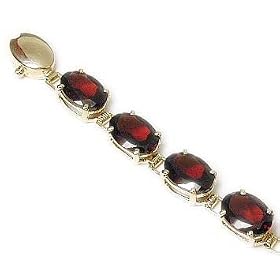 14k Oval Garnet Line Bracelet by JewelryWeb