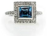18K White Gold Ring, Bezel Set with a Square-Shape Blue Topaz Color-Stone and Surrounded by Pave Set Diamonds.