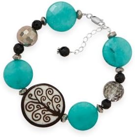 7" + 1" Multistone Tree Of Life Bead Bracelet 7" + 1" extension bracelet with dyed colored, czech glass, black onyx, and a wooden Tree of Life bead. The rondell czech glass beads are 3mm x 5mm, the faceted round czech glass beads are 12mm, the faceted black onyx beads are 6mm, the faceted Synthetic Turquoise dyed colored beads are 17.5mm, and the Tree of Life wooden bead is 26mm. This bracelet has a lobster clasp closure. .925 Sterling Silver