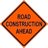 ROAD CONSTRUCTION AHEAD caution highway sign