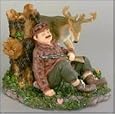 Deer Hunter Sleeping Against Log