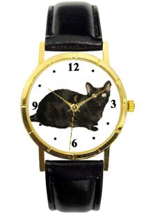 Black Cat watch classic size of 1.1/4 inch diameter Has gold tone case with black leather band. Battery operated.