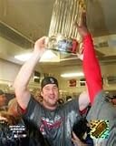 Derek Lowe holding 2004 World Series Trophy after the Red Sox Victory over the Cardinals Officially Licensed Sports Photo - 16 x 20 - Framing Options Available - Click For Details