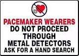 PACEMAKER WEARERS DO NOT PROCEED THROUGH METAL DETECTORS ASK FOR A HAND SEARCH (W/GRAPHIC) Sign - 14