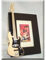 From Amazon.com. Click for details:
 Home: Marcus Miller/Guitar Photo Frame 4"x6" - KeNi Home: Marcus Miller/Guitar Photo Frame 4"x6" - KeNi