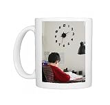 An 11-year old boy doing homework, Paris, France, Europe Photo Mugs