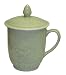 Celadon covered coffee / tea mugs - flower design, set of 2