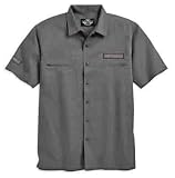Harley Davidson Men's Short Sleeve Garage Shirt with Skull Graphic--LIMITED EDITION. New for 2009. Long-lasting, wrinkle-resistant cotton/poly blend garage shirt with button front, two zippered chest pockets, and embroidered Harley-Davidson graphics on the right sleeve and left chest. Appliqu� and embroidered skull graphics on back. 96006-09VM