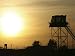 Camp Warhorse Guard Tower at Sunset Photographic Poster Print by Stocktrek Images, 16...