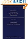 Electronic Processes in Organic Crystals and Polymers