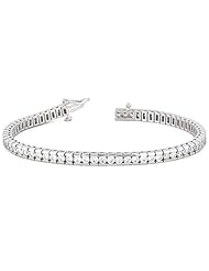 14KT White Gold Contemporary Diamond Tennis Bracelet featuring 55 Channel Set Round Brilliant Cut Diamonds in a High Polished Setting. 3 7/8 CTW