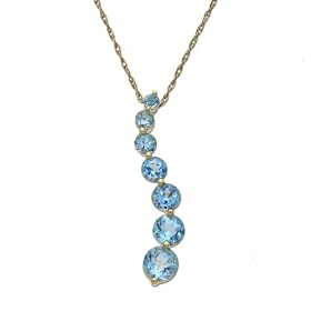 14k Yellow Gold Blue Topaz Journey Pendant by Amazon.com Collection