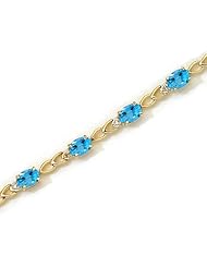 14K Yellow Gold Oval Blue Topaz and Diamond Bracelet