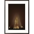 Lights shine up at the Washington Monument on a foggy evening Framed Art Poster Print by Karen Kasmauski, 21x29