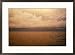 The Caribbean Sea reflects the sunset off Caye Caulker, Belize Framed Art Poster Print by Stephen Alvarez, 29x21