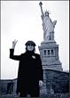 John Lennon in front of Statue of Liberty 24x36 Poster Framed