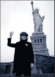 John Lennon in front of Statue of Liberty 24x36 Poster Framed