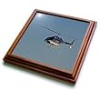 Helicopter hovers in blue sky - 8x8 Trivet With 6x6 Ceramic Tile by 3dRose LLC
