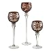 New Set Of Three Matching Red And Silver Glass Candleholders With A Round Shape In Graduating Sizes