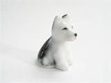 Dolls House Minatures Black and white porcelain dog sitting with